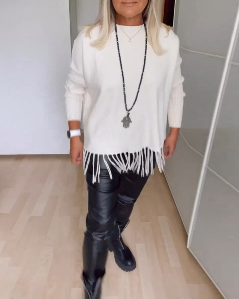 Enobarvni sproščeni pulover z resicami