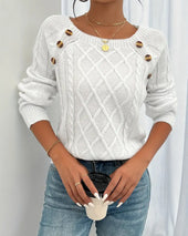 Enobarvni pulover z raglan rokavi in kitastim vzorcem