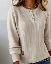 Pulover z okrasnimi gumbi in raglan rokavi