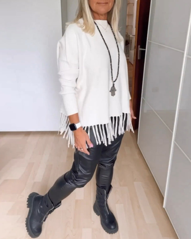 Enobarvni sproščeni pulover z resicami