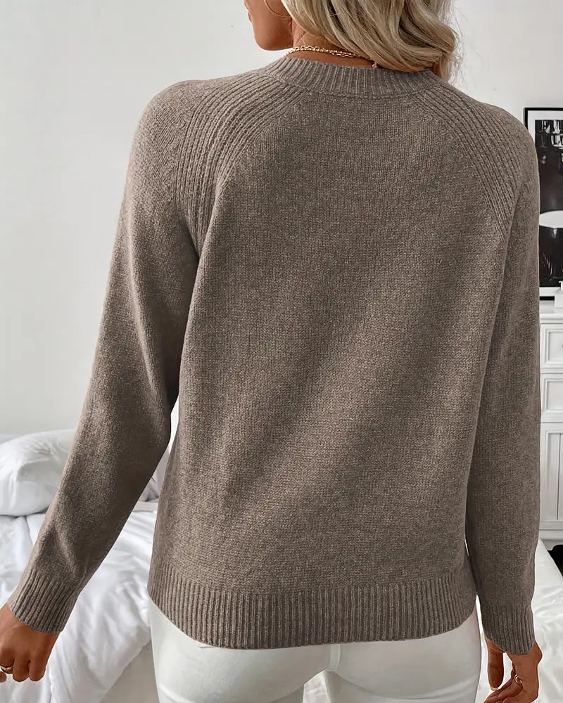 Pulover z gumbi in raglan rokavi