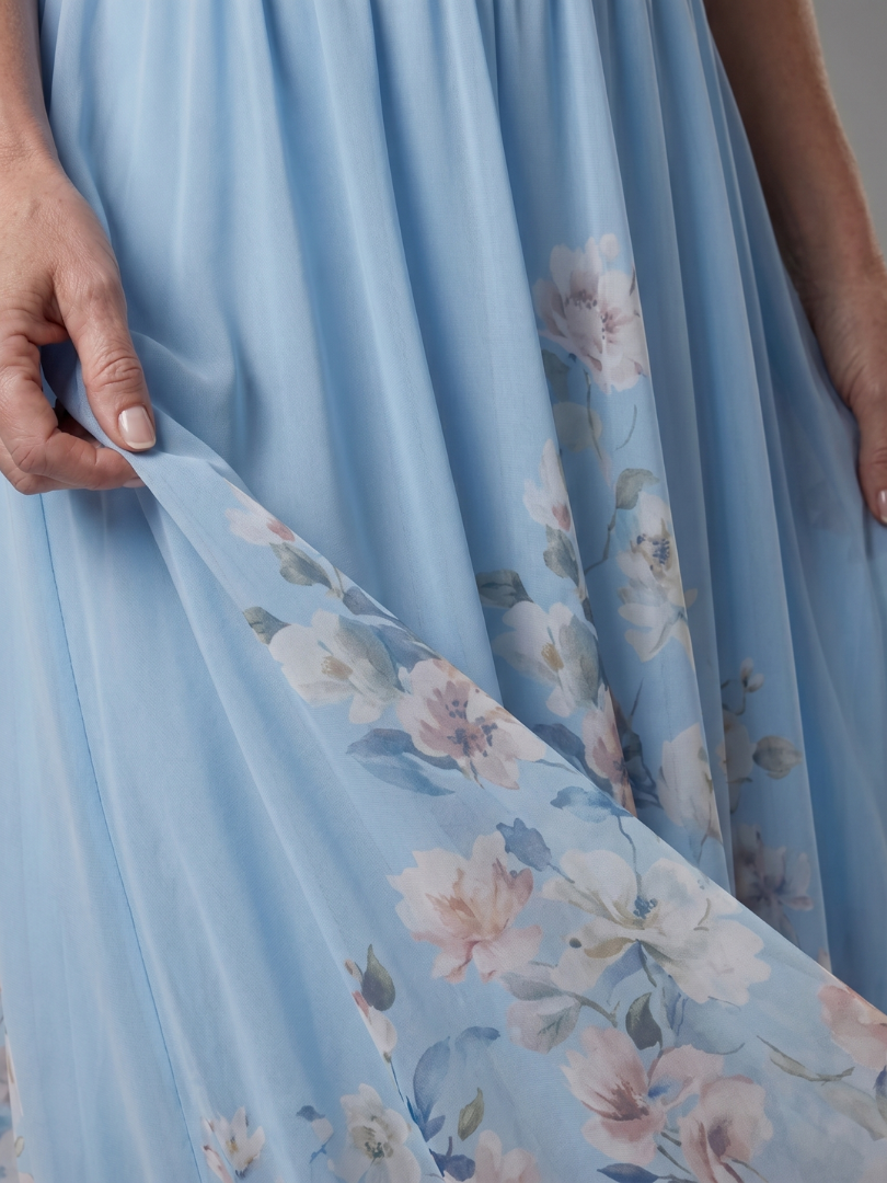 Daniela | Vestido Midi sem Mangas com Barra Floral