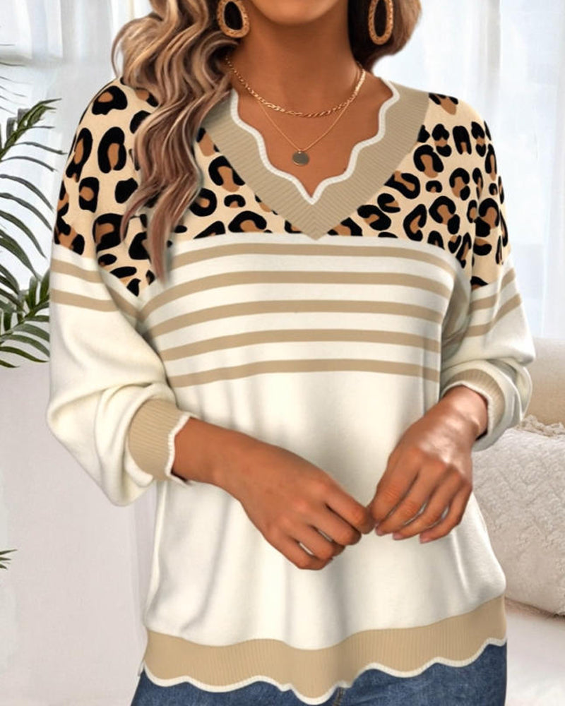 Pulover z V-izrezom in kontrastnim leopardjim vzorcem
