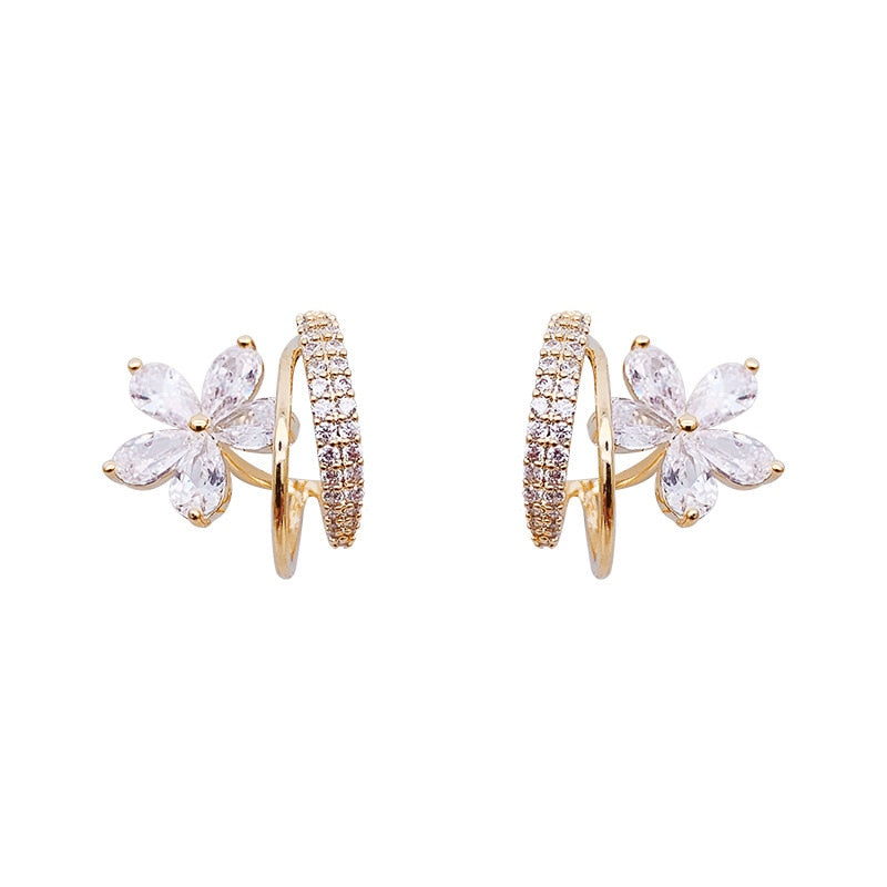 Blumenohrringe mit Zirkonia-Einlagen in Gold