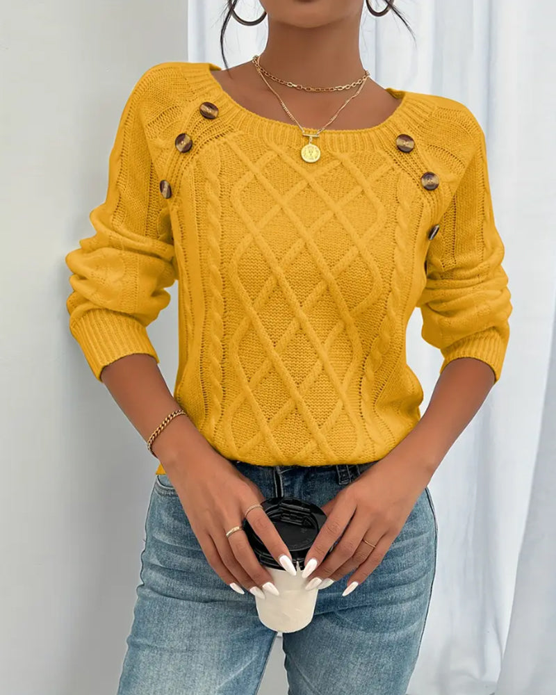Enobarvni pulover z raglan rokavi in kitastim vzorcem