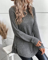 Pulover z raglan rokavi in vozlom ob strani