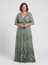 Elga – Vestido longo florido com decote em V
