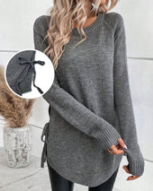 Pulover z raglan rokavi in vozlom ob strani