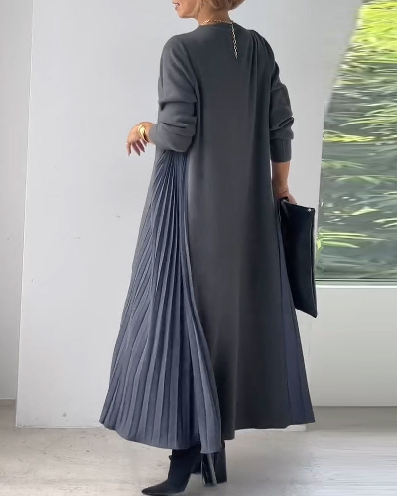 Elegantna plisirana pletena obleka z dolgimi rokavi