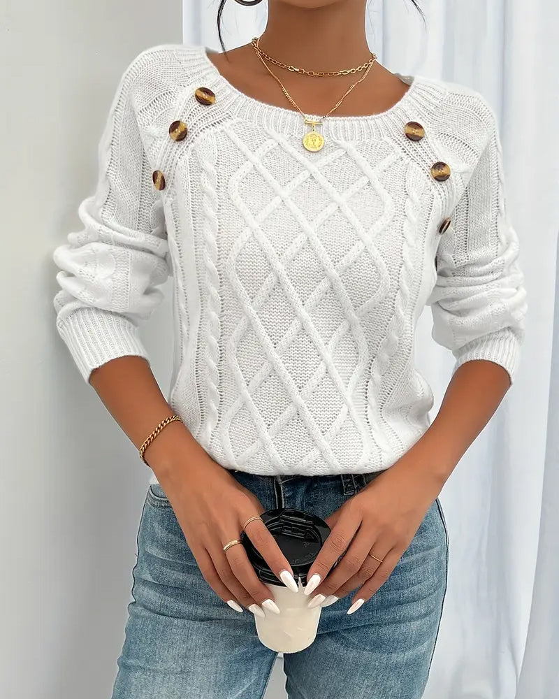 Enobarvni pulover z raglan rokavi in kitastim vzorcem