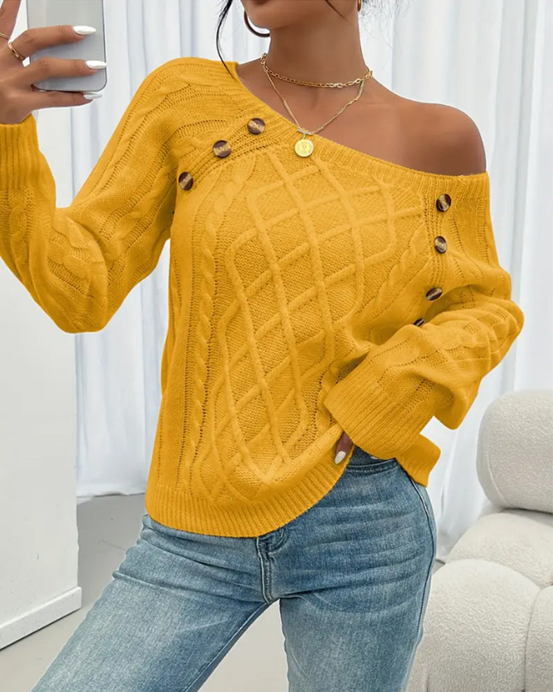 Enobarvni pulover z raglan rokavi in kitastim vzorcem