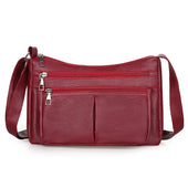 Hladká crossbody kabelka s viacerými vreckami