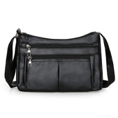 Hladká crossbody kabelka s viacerými vreckami