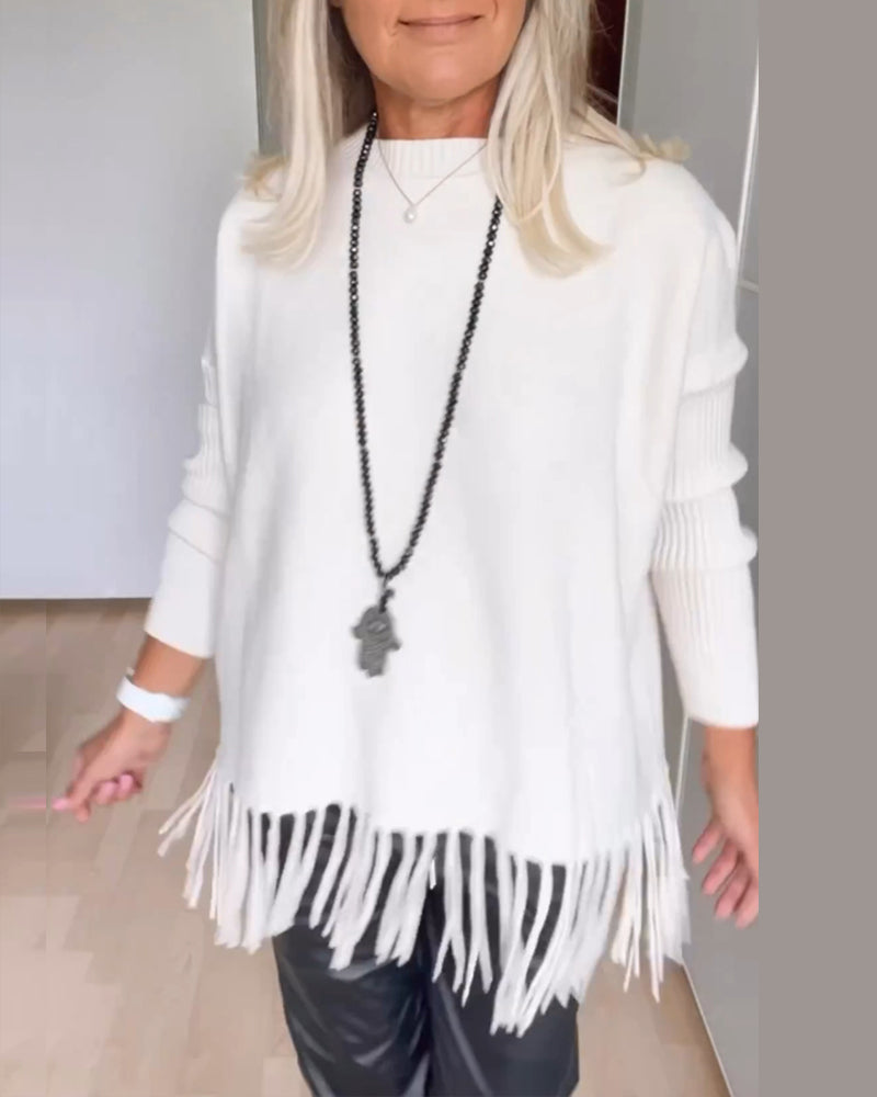 Enobarvni sproščeni pulover z resicami