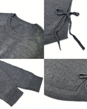 Pulover z raglan rokavi in vozlom ob strani
