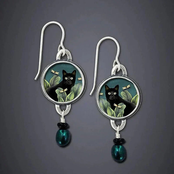 Célia | Brincos Gato Preto Tropical